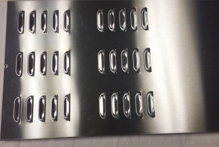 HFI Product - polished stainless steel sheet metal panel featuring stamped, raised louver vents
