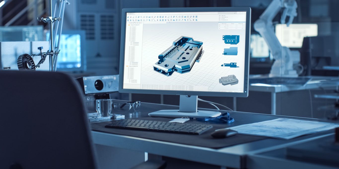 On the Desk Computer With CAD Software and Design of 3D Industrial Machinery Component.